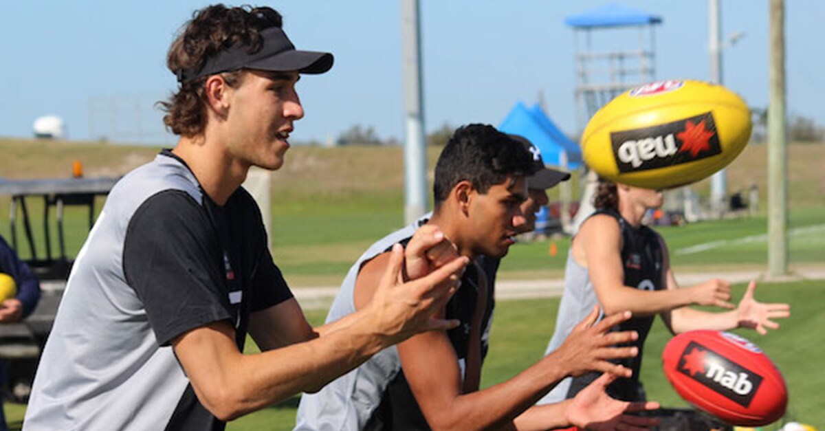 WebSuperdraftarticle.jpg Max King fires out a handball in Academy training in Florida - Brisbane Lions